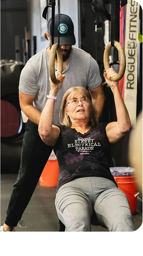 TWM Client working on upper body strength as part of the training